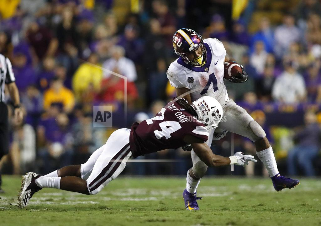 Tyler Kaufman LSU running back Nick Brossette (4) is tackled by Mississippi State defensive end Gerri Green (4) during an NCAA college football game in Baton Rouge, La., Saturday, Oct. 20, 2018. LSU won 19-3. (AP Photo/Tyler Kaufman)