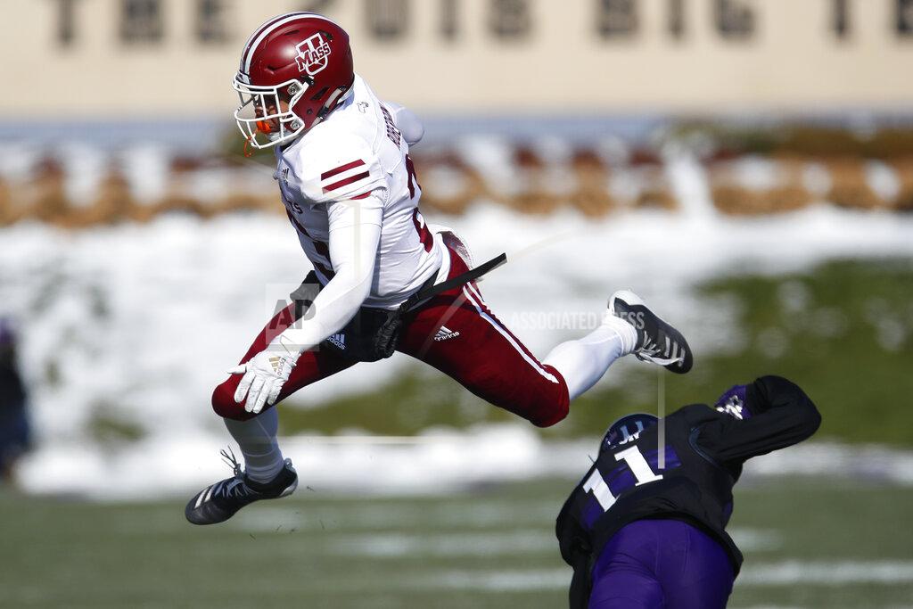 Jim Young Massachusetts' Cam Roberson, left, is hit by Northwestern's A.J. Hampton during the first half of an NCAA college football game Saturday, Nov. 16, 2019, in Evanston, Ill. (AP Photo/Jim Young)