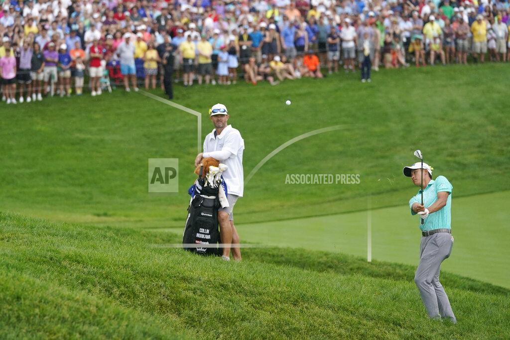 Darron Cummings Collin Morikawa chips to the 18th green during the first playoff hole during the final round of the Memorial golf tournament, Sunday, June 6, 2021, in Dublin, Ohio. (AP Photo/Darron Cummings)