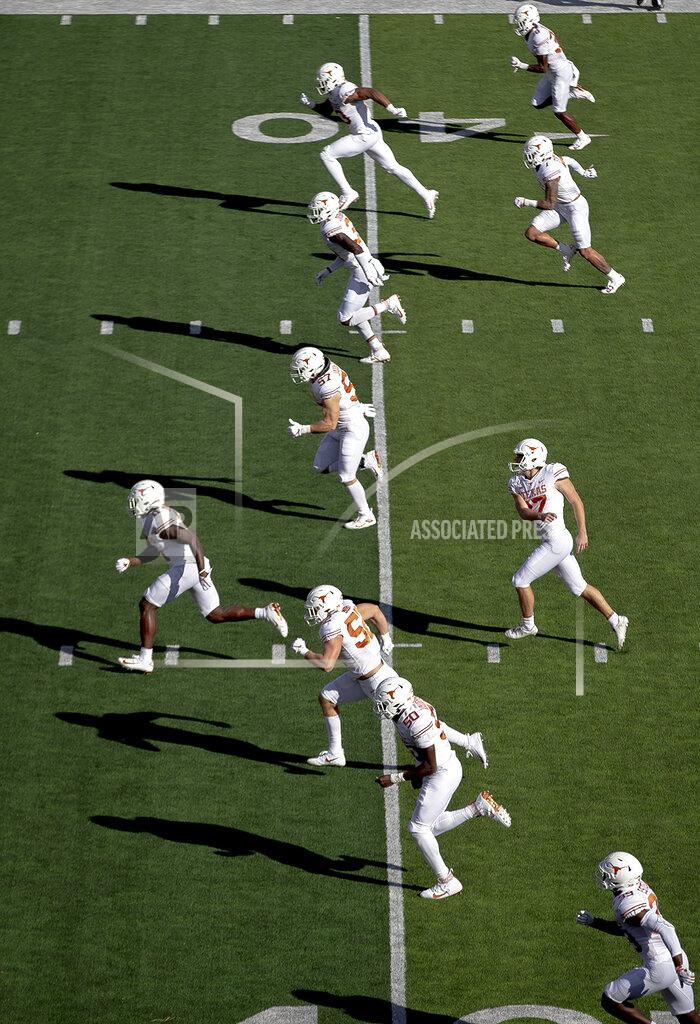 Nick Wagner Texas placekicker Cameron Dicker (17) watches his kick as his teammates run downfield during an NCAA college football game against Baylor on Saturday, Nov. 23, 2019, in Waco, Texas. (Nick Wagner/Austin American-Statesman via AP)