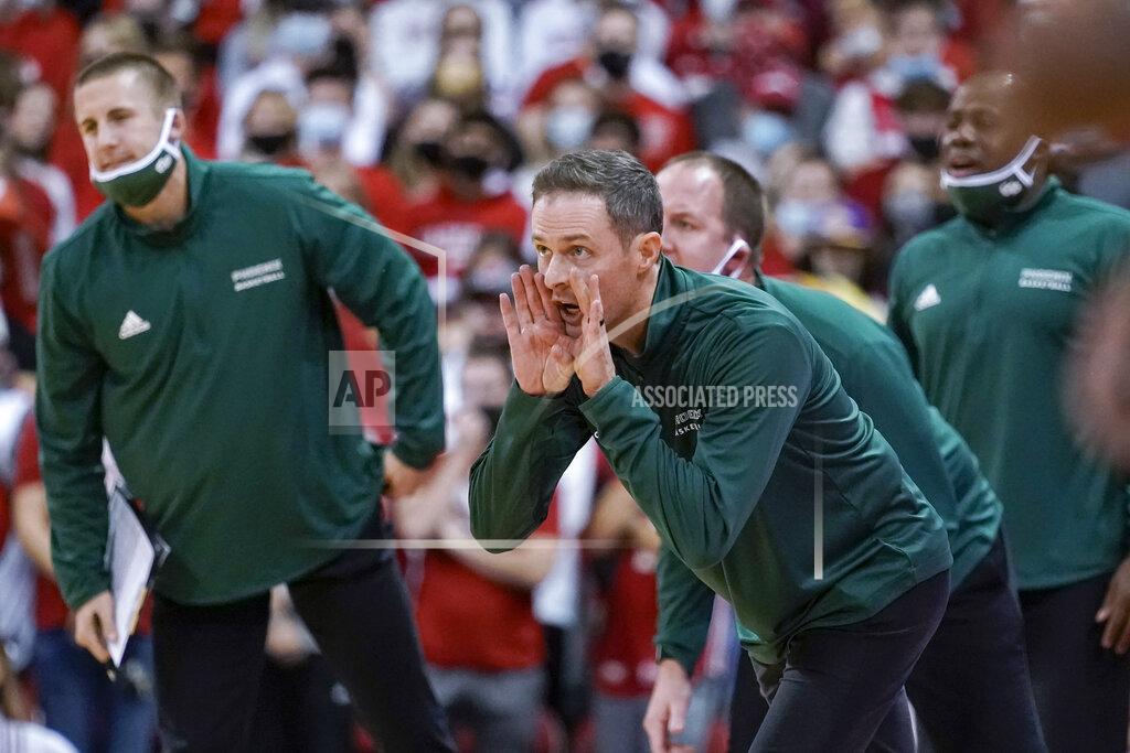 Andy Manis Wisconsin-Green Bay coach Will Ryan yells to the team during the first half of an NCAA college basketball game against Wisconsin o Friday, Nov. 12, 2021, in Madison, Wis. (AP Photo/Andy Manis)