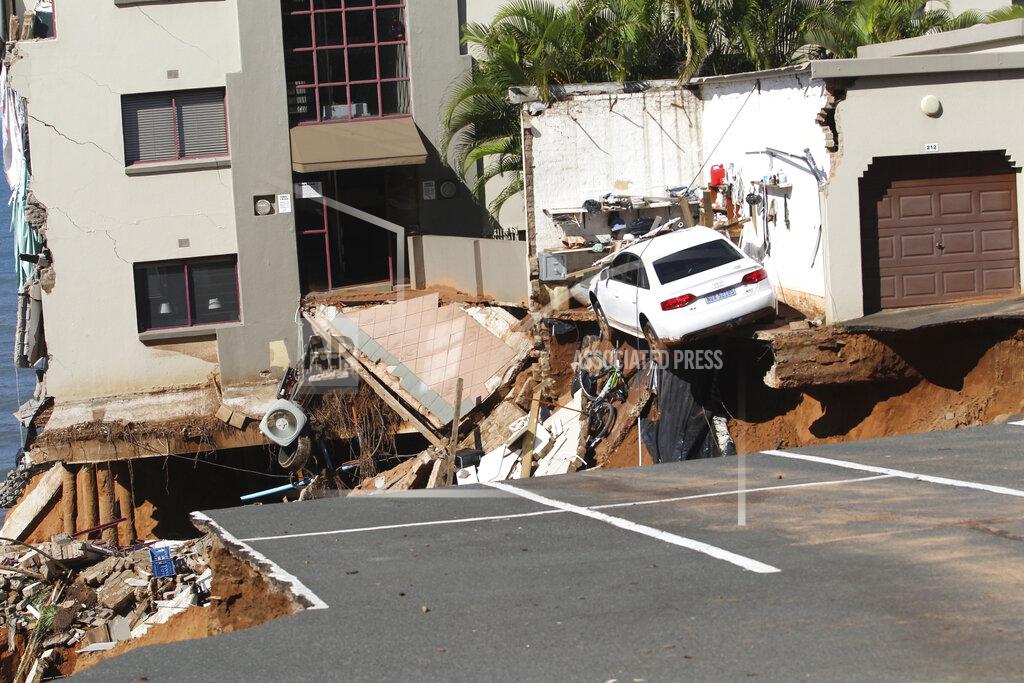 Uncredited A flood-damaged apartment building near Durban, South Africa, Monday, May 23, 2022. More than 300 people have been evacuated from their homes as a result of renewed heavy rains, flooding and mudslides in South Africa's KwaZulu-Natal province, weeks after severe flooding killed more than 400 people and displaced more than 40,000 others. (AP Photo)