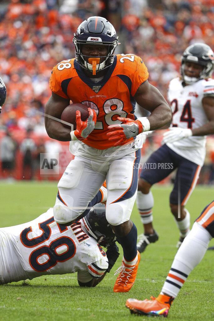 Margaret Bowles Denver Broncos running back Royce Freeman (28) carries the ball in an NFL game against the Chicago Bears, Sunday Sept. 15, 2019, in Denver. The Bears defeated the Broncos 16-14. (Margaret Bowles via AP)