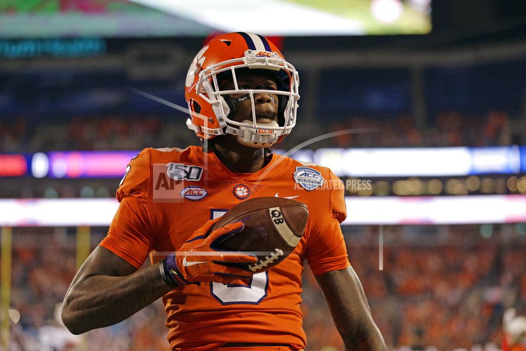 Gerry Broome Clemson wide receiver Tee Higgins (5) reacts following his touchdown against Virginia duriung the first half of the Atlantic Coast Conference championship NCAA college football game in Charlotte, N.C., Saturday, Dec. 7, 2019. (AP Photo/Gerry Broome)