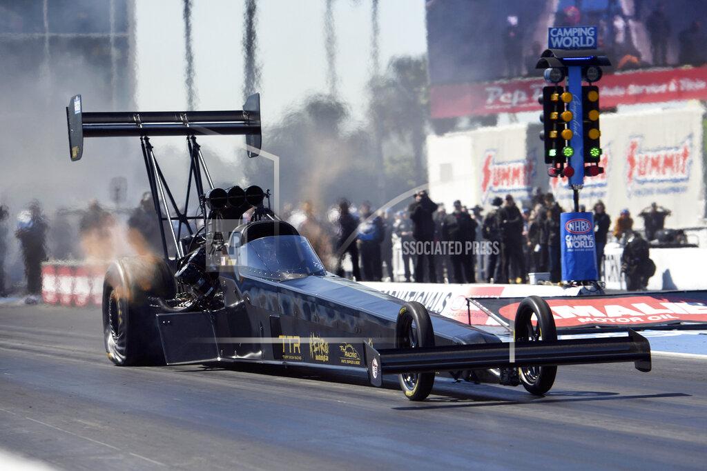 Michael Allio In this photo provided by the NHRA, Tripp Tatum wins the Amalie Motor Oil NHRA Gatornationals Top Fuel auto race at Gainesville Raceway, in Gainesville, Fla., Sunday, March 13, 2022. (Michael Allio/NHRA via AP)