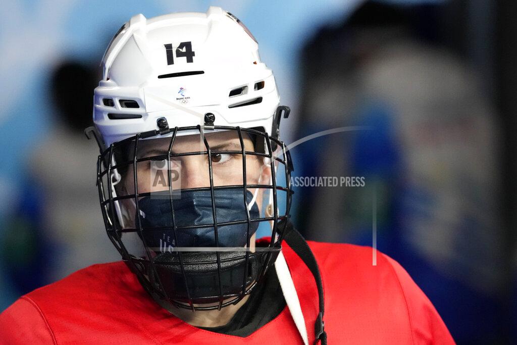 Petr David Josek Brianna Decker, of the United States' women's hockey team, walks to the ice for a practice session at the 2022 Winter Olympics, Wednesday, Feb. 2, 2022, in Beijing. (AP Photo/Petr David Josek)