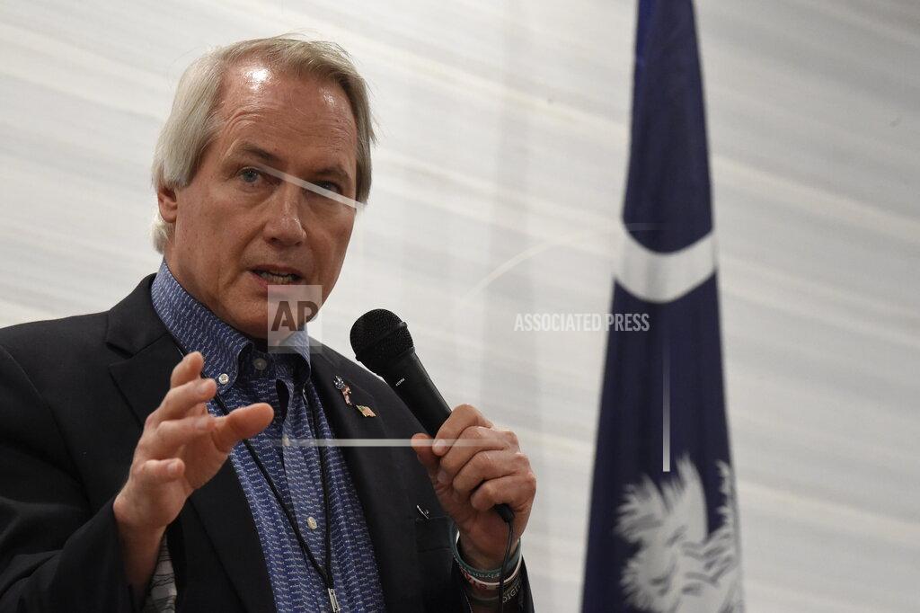 Meg Kinnard Pro-Trump attorney Lin Wood, a candidate for chairman of the South Carolina Republican Party, speaks to attendees of the Richland County GOP convention on Friday, April 30, 2021, in Columbia, S.C. (AP Photo/Meg Kinnard)