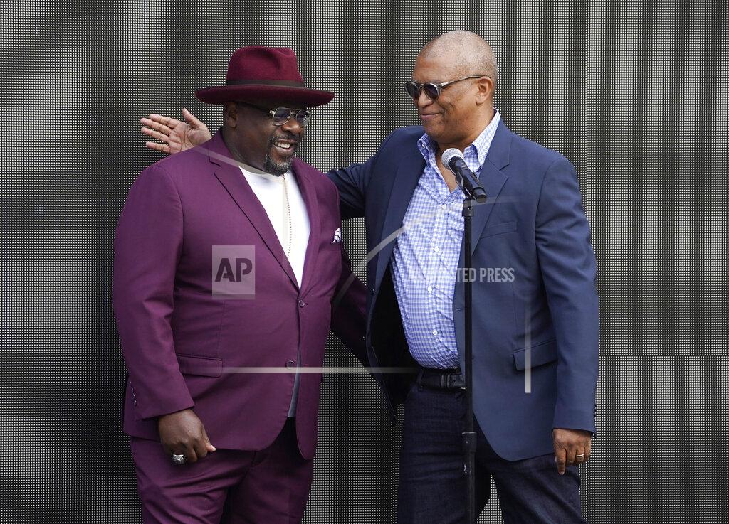 Chris Pizzello Cedric the Entertainer, left, host of Sunday's 73rd Primetime Emmy Awards, is greeted by executive producer Reginald Hudlin during the show's Press Preview Day, Wednesday, Sept. 14, 2021, at the Television Academy in Los Angeles. The awards show honoring excellence in American television programming will be held at the Event Deck at L.A. Live. (AP Photo/Chris Pizzello)