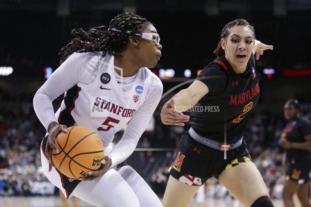 Young Kwak Stanford forward Francesca Belibi (5) keeps the ball away from Maryland forward Mimi Collins (2) during the first half of a college basketball game in the Sweet 16 round of the NCAA tournament, Friday, March 25, 2022, in Spokane, Wash. (AP Photo/Young Kwak)