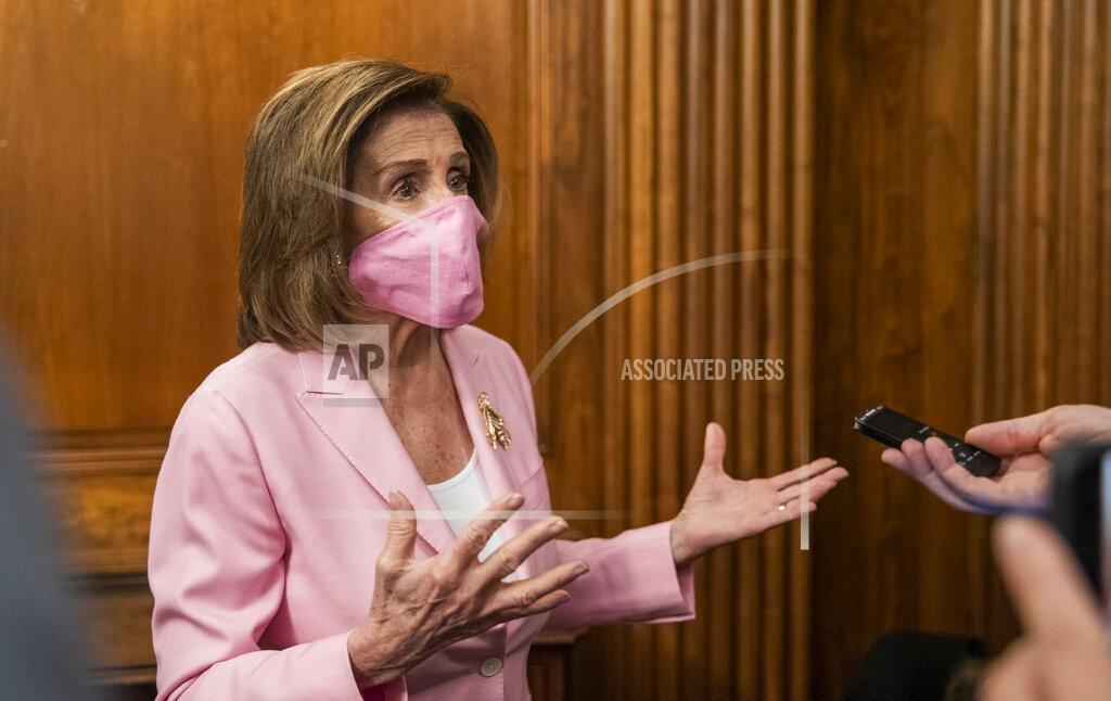 House Speaker Nancy Pelosi of Calif., talks to reporters on Capitol Hill, Tuesday, May 5, 2020, in Washington. (AP Photo/Manuel Balce Ceneta)