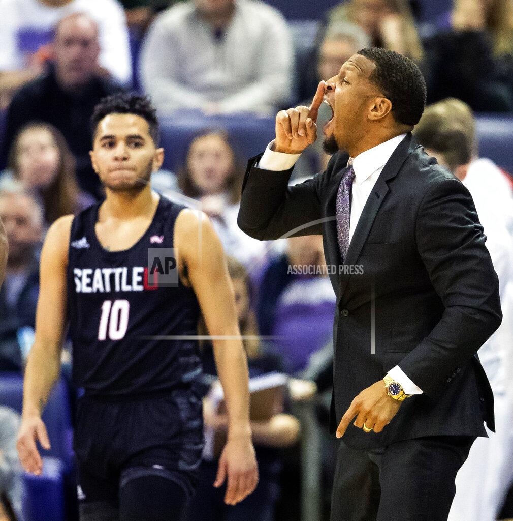 Andy Bao Washington assistant coach Will Conroy gives instructions to his team during the first half of an NCAA college basketball game against Seattle, Tuesday, Dec. 17, 2019, in Seattle. (Andy Bao/The Seattle Times via AP)