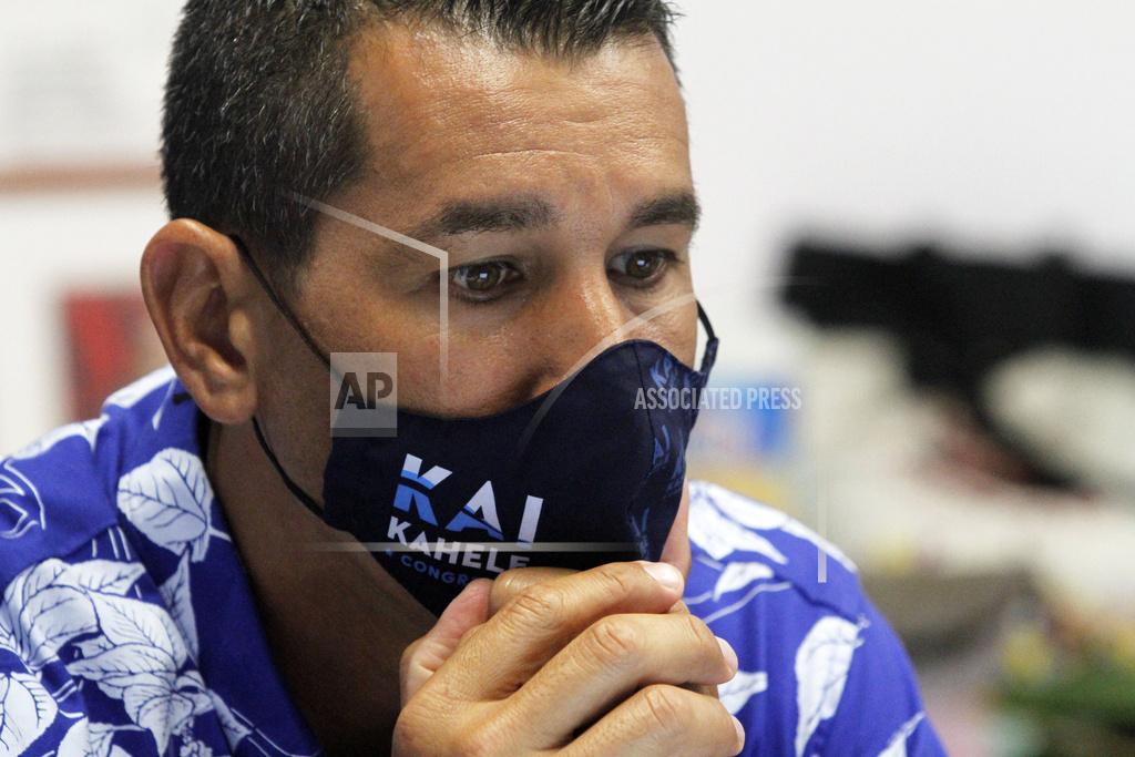 Kelsey Walling U.S. House of Representatives candidate Kai Kahele monitors election results at his Hilo, Hawaii, headquarters on Tuesday, Nov. 3, 2020. Kahele and his team have been following more than 50 state races and has connected with 33 potential future colleagues. (Kelsey Walling/Hawaii Tribune-Herald via AP)
