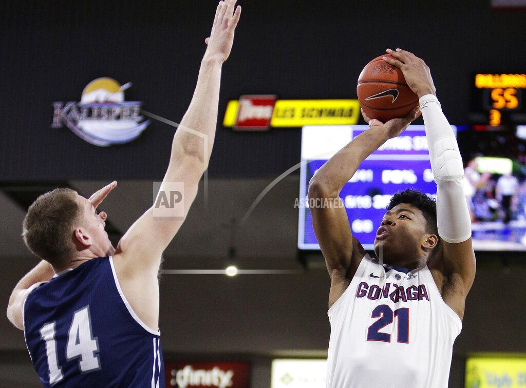 Young Kwak Gonzaga forward Rui Hachimura (21) shoots while defended by Loyola Marymount center Mattias Markusson (14) during the second half of an NCAA college basketball game in Spokane, Wash., Thursday, Jan. 17, 2019. Gonzaga won 73-55. (AP Photo/Young Kwak)