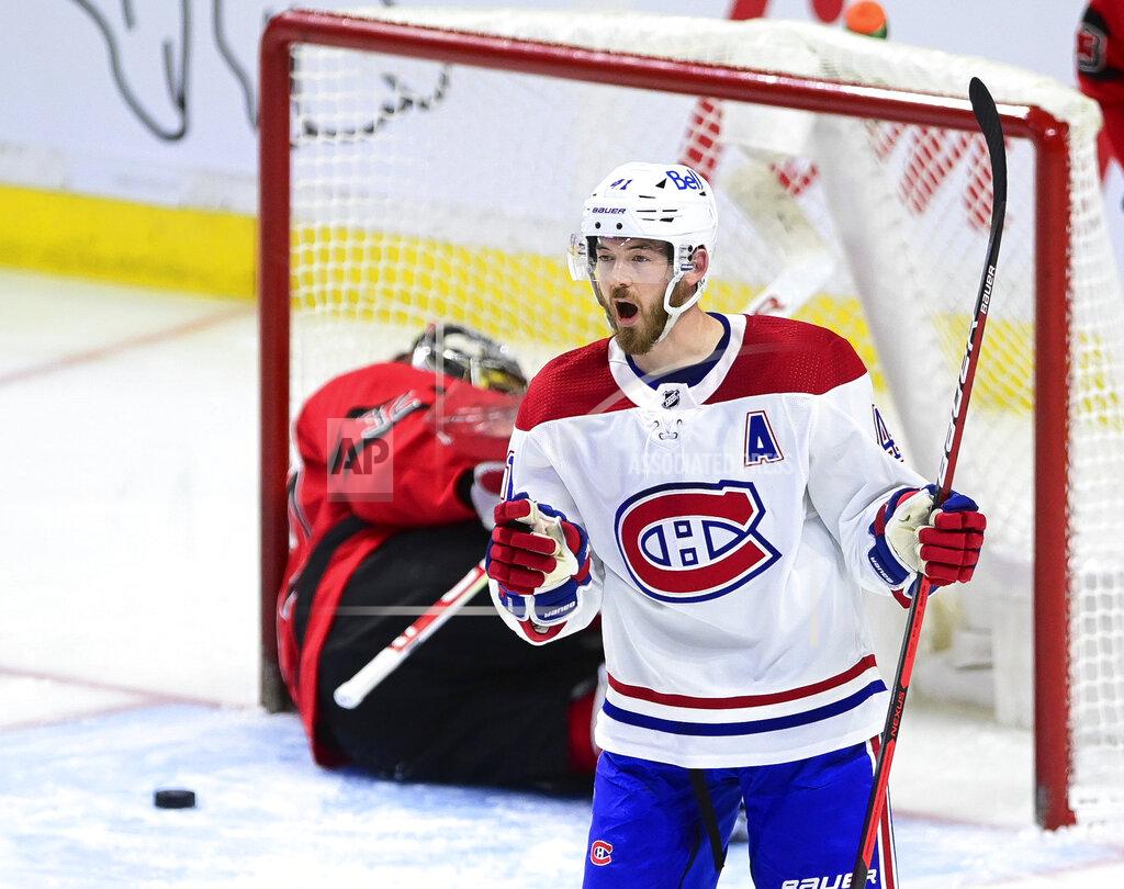 Sean Kilpatrick Montreal Canadiens' Paul Byron (41) celebrates a shorthanded goal on Ottawa Senators goalie Filip Gustavsson (32) during the second period of an NHL hockey game Thursday, April 1, 2021, in Ottawa, Ontario. (Sean Kilpatrick/The Canadian Press via AP)
