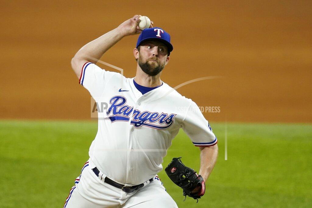 Tony Gutierrez Texas Rangers starting pitcher Jordan Lyles throws during the fifth inning of the team's baseball game against the Houston Astros in Arlington, Texas, Tuesday, Sept. 14, 2021. (AP Photo/Tony Gutierrez)