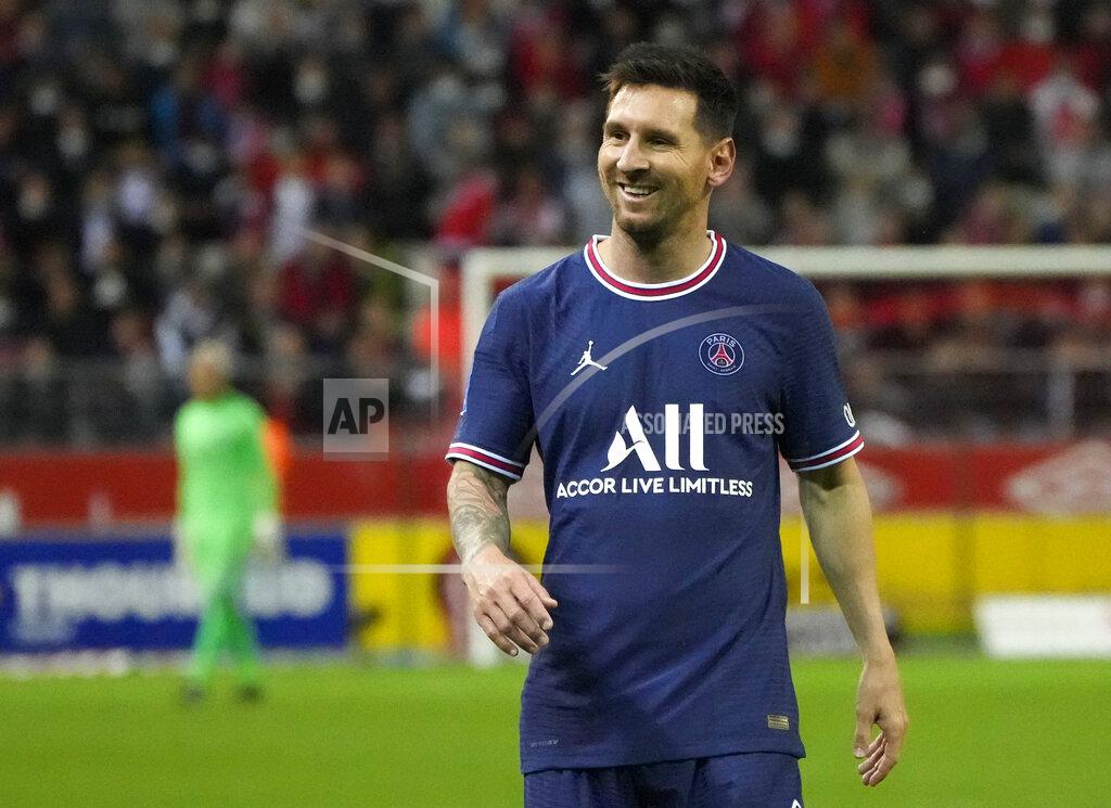 Francois Mori PSG's Lionel Messi smiles during the France League One soccer match between Reims and Paris Saint-Germain, at the Stade Auguste-Delaune in Reims, France, Sunday, Aug. 29, 2021. (AP Photo/Francois Mori)