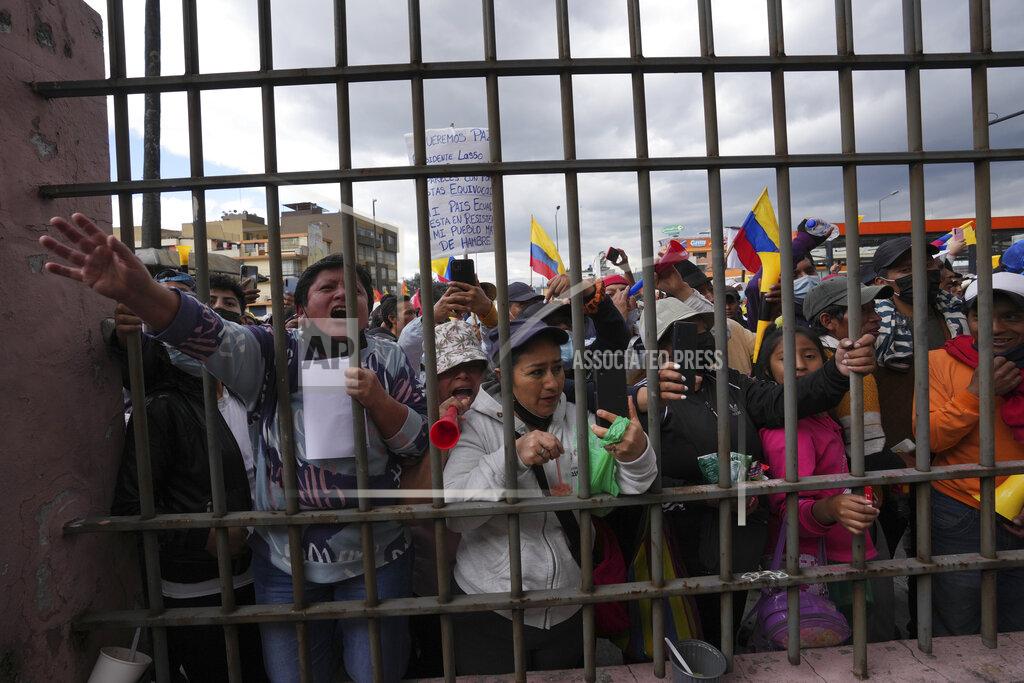 Dolores Ochoa Indigenous protesters gather outside the Episcopal Conference headquarters where Indigenous leaders dialogue with the government in Quito, Ecuador, Thursday, June 30, 2022. Ecuador's government and the country's main Indigenous group reached an agreement Thursday to end 18 days of often-violent strikes that had virtually paralyzed the country. (AP Photo/Dolores Ochoa)