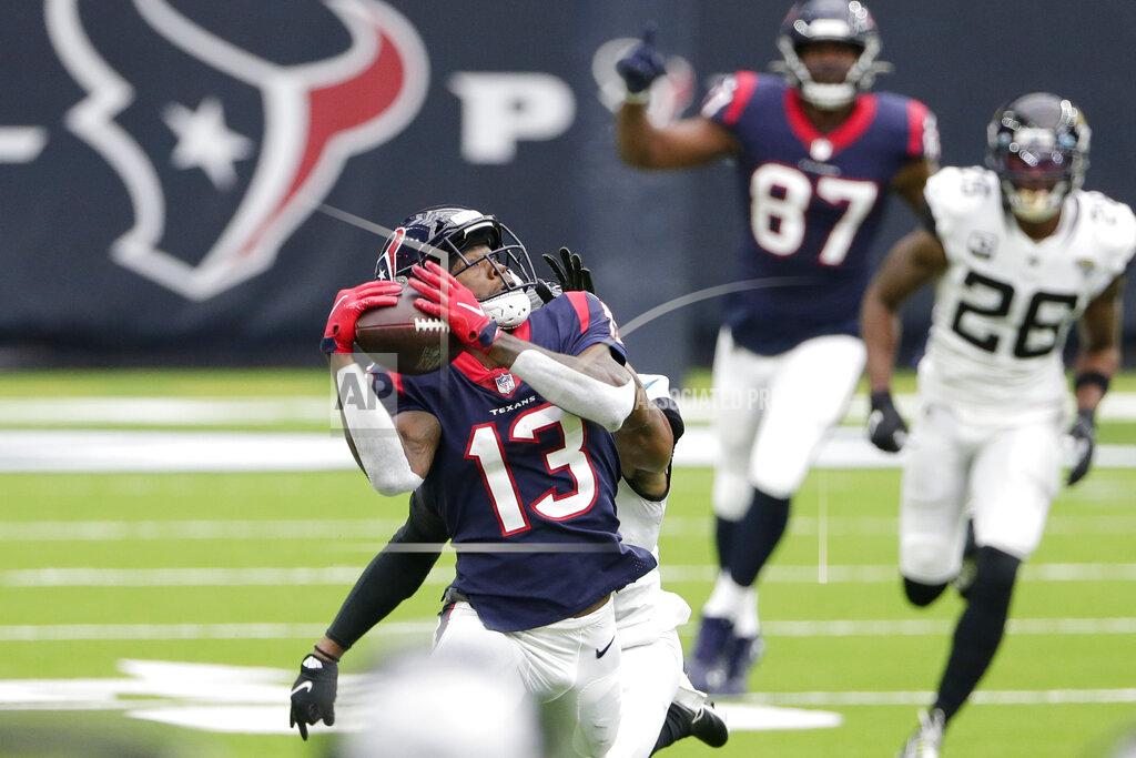 Watson tosses 3 TDs as Texans get 1st win, 30-14 over Jags