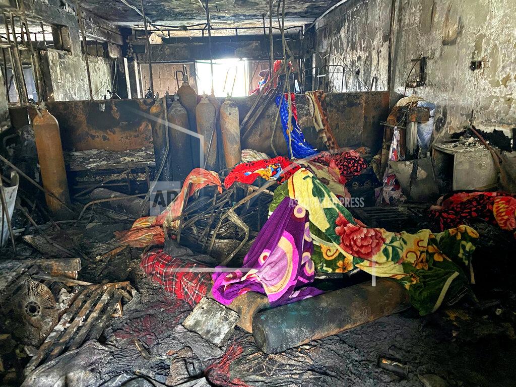 Khalid Mohammed The intensive care unit of the Ibn al-Khatib hospital is damaged following a fire that broke out of last Saturday evening killing over 80 people and injuring over 100, in Baghdad, Iraq, Tuesday, April 27, 2021. Medical staff who witnessed the first moments of the fire described horrific scenes: deafening screams, a patient who jumped to his death to escape the inferno and relatives who died because they refused to abandon coronavirus patients tethered to ventilators. (AP Photo/Khalid Mohammed)