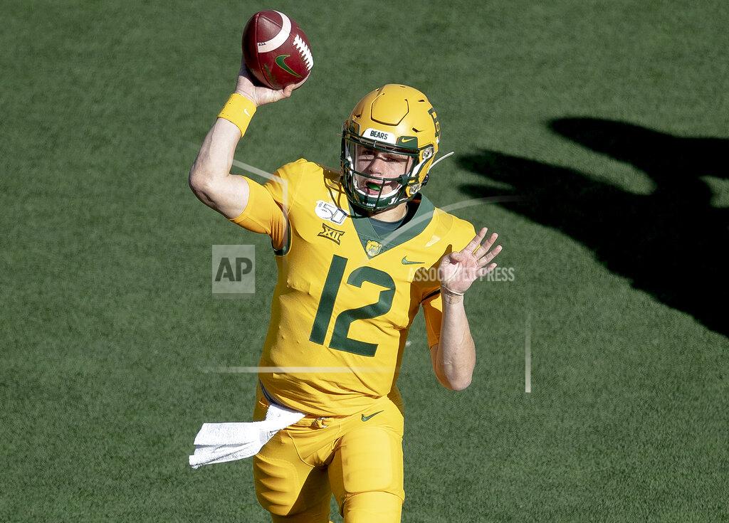Nick Wagner Baylor quarterback Charlie Brewer (12) throws the ball against Texas during an NCAA college football game on Saturday, Nov. 23, 2019, in Waco, Texas. (Nick Wagner/Austin American-Statesman via AP)