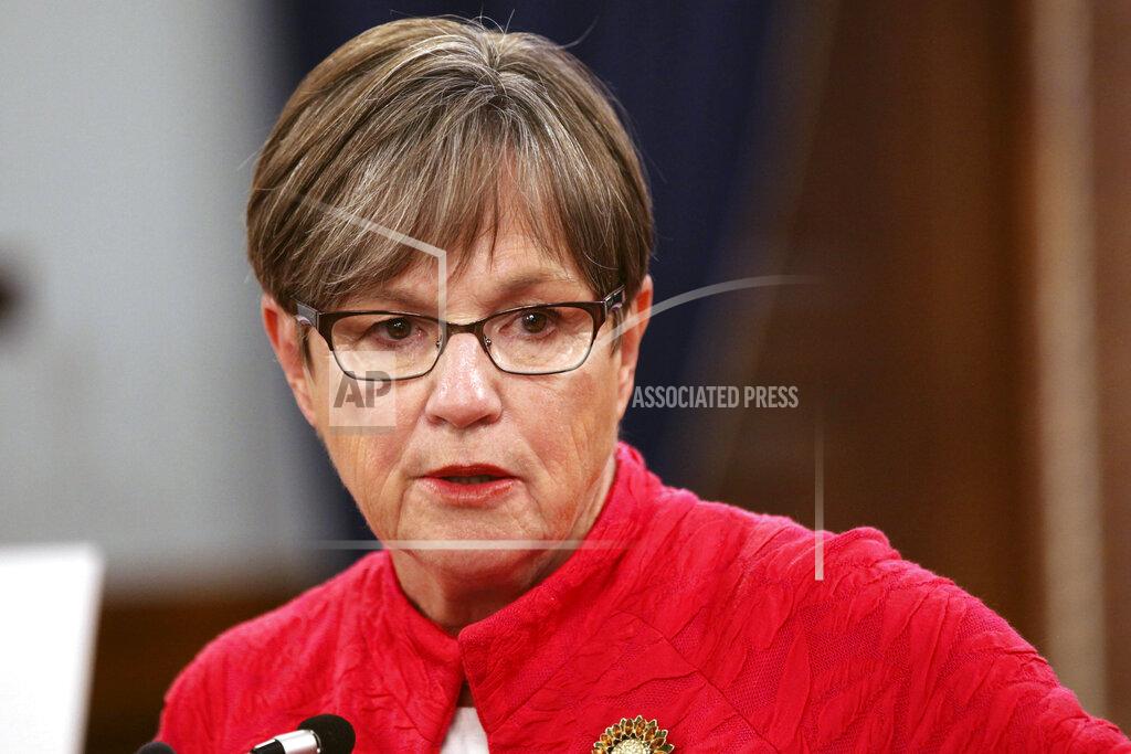 John Hanna Kansas Gov. Laura Kelly speaks to reporters during a news conference, Wednesday, July 28, 2021, at the Statehouse in Topeka, Kan. Kelly is imposing a mask mandate for state government workers and visitors to state buildings in most of Kansas' 105 counties. (AP Photo/John Hanna)
