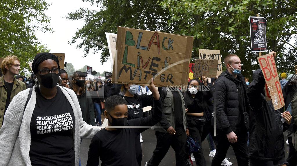 Alberto Pezzali Black Lives Matter protestors march from Hyde Park during protests in London, Friday, June 12, 2020 in response to the recent killing of George Floyd by police officers in Minneapolis, USA, that has led to protests in many countries and across the US.(AP Photo/Alberto Pezzali)