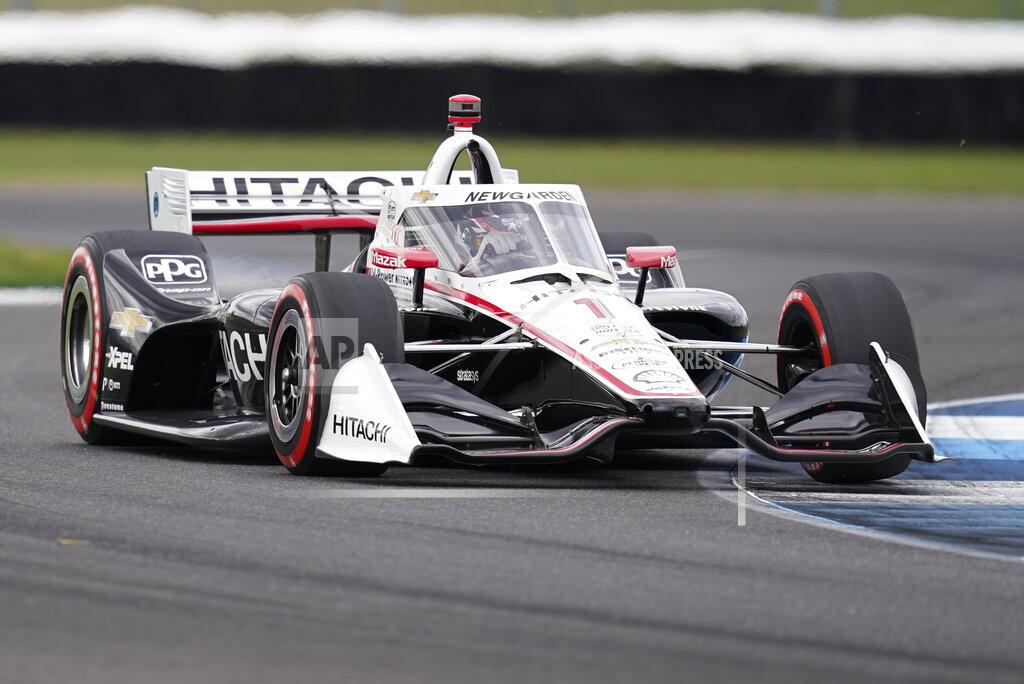 Darron Cummings Josef Newgarden drives into a turn during an IndyCar auto race at Indianapolis Motor Speedway, Friday, Oct. 2, 2020, in Indianapolis. (AP Photo/Darron Cummings)