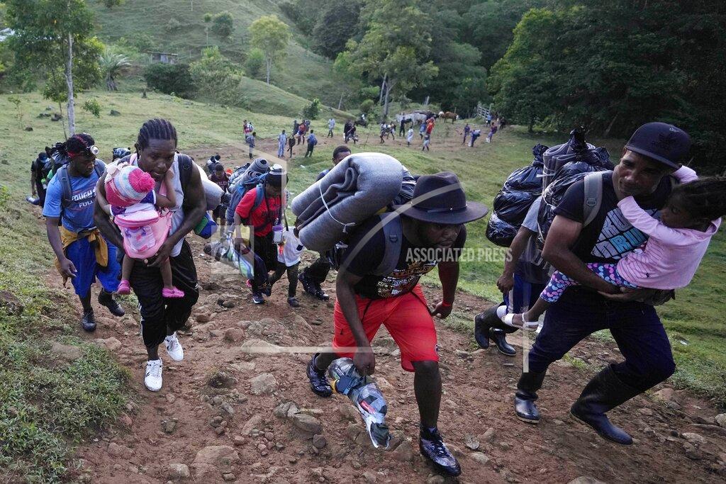 Fernando Vergara Migrants continue on their trek north, near Acandi, Colombia, Wednesday, Sept. 15, 2021. The migrants, mostly Haitians, are on their way to crossing the Darien Gap from Colombia into Panama dreaming of reaching the U.S. (AP Photo/Fernando Vergara)