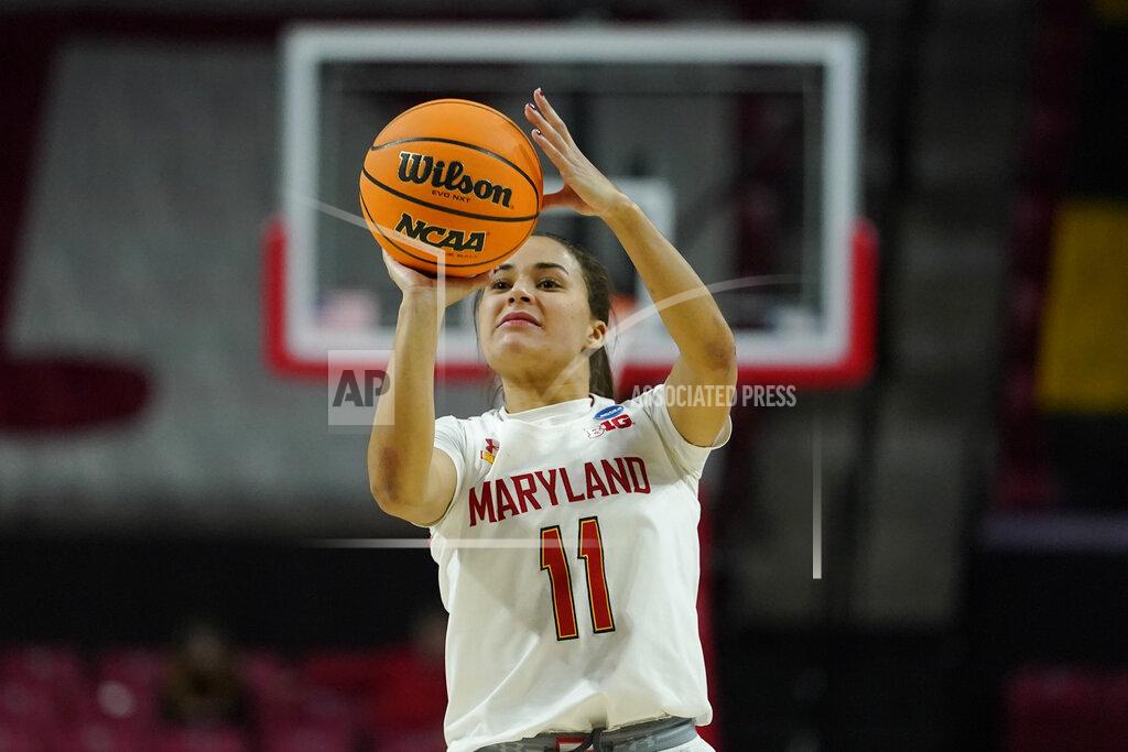 Julio Cortez Maryland guard Katie Benzan shoots against Florida Gulf Coast during the second half of a college basketball game in the second round of the NCAA tournament, Sunday, March 20, 2022, in College Park, Md. Maryland won 89-65. (AP Photo/Julio Cortez)