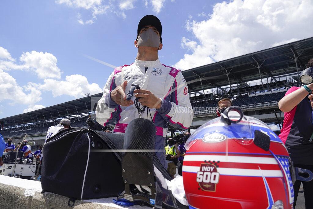 Darron Cummings Alex Palou, of Spain, looks at his qualification results for the Indianapolis 500 auto race at Indianapolis Motor Speedway, Sunday, Aug. 16, 2020, in Indianapolis. (AP Photo/Darron Cummings)