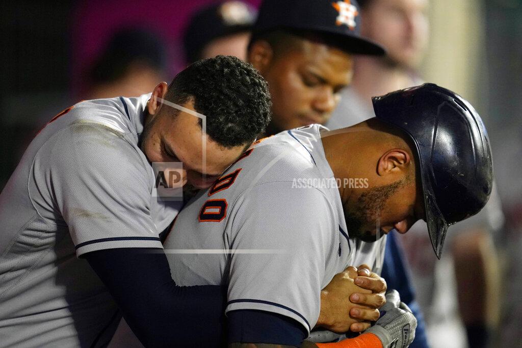 Marcio Jose Sanchez Houston Astros' Martin Maldonado, right, is hugged by Carlos Correa after Maldonado's solo home run during the sixth inning of a baseball game against the Los Angeles Angels Tuesday, Sept. 21, 2021, in Anaheim, Calif. (AP Photo/Marcio Jose Sanchez)