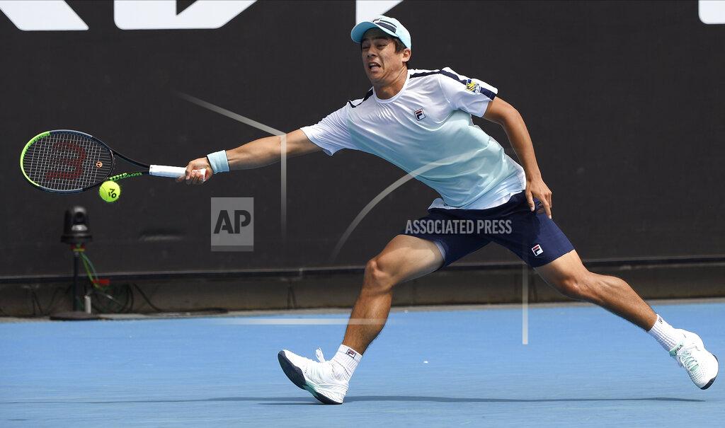 Andy Brownbill United States' Mackenzie McDonald hits a backhand return to South Africa's Lloyd Harris during their third round match at the Australian Open tennis championship in Melbourne, Australia, Saturday, Feb. 13, 2021.(AP Photo/Andy Brownbill)