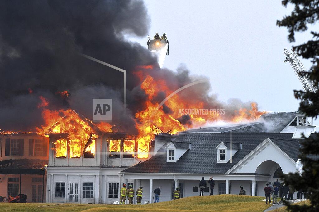 Daniel Mears A fire burns at the main building at Oakland Hills Country Club in Bloomfield Township, Mich., on Thursday, Feb. 17, 2022. Firefighters battled a blaze at a more than century-old country club Thursday in suburban Detroit that's hosted several major golf tournaments and is one of Michigan’s most exclusive golf clubs.(Daniel Mears /Detroit News via AP)