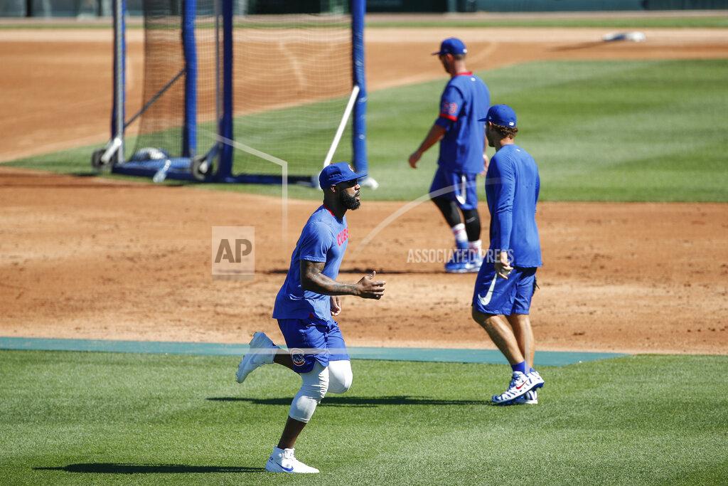 Kamil Krzaczynski Chicago Cubs right fielder Jason Heyward warms up during baseball practice at Wrigley Field on Friday, July 3, 2020 in Chicago. (AP Photo/Kamil Krzaczynski)