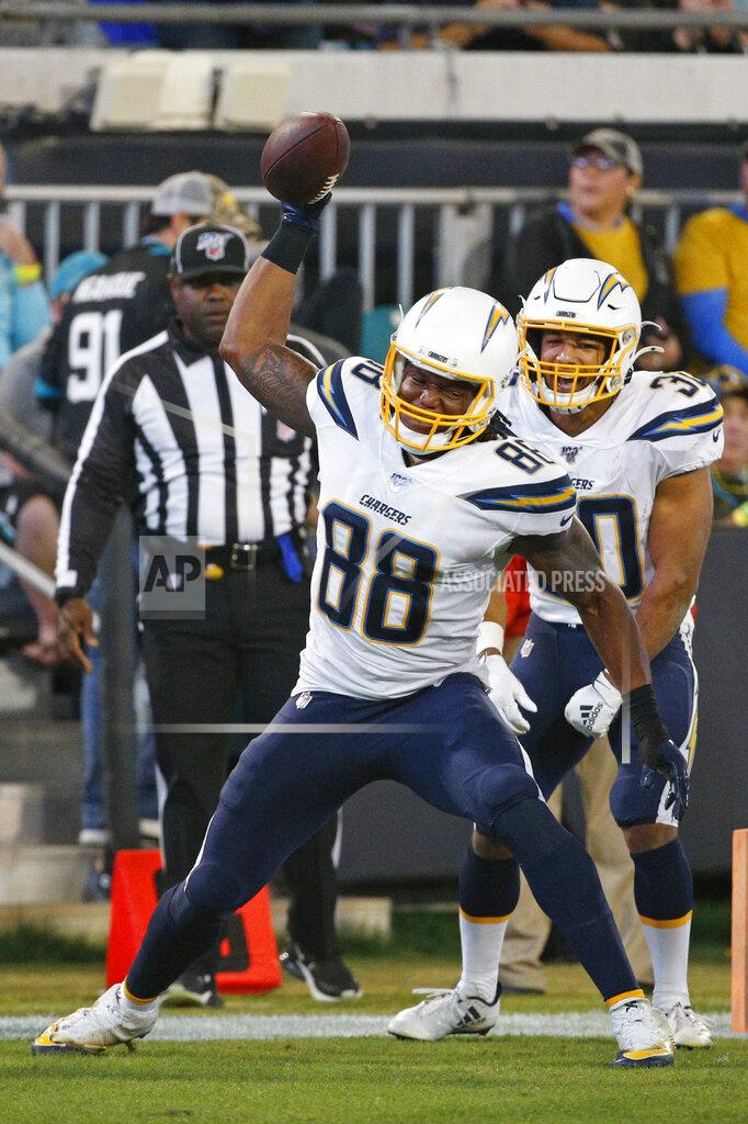 Stephen B. Morton Los Angeles Chargers tight end Virgil Green (88) spikes the ball after scoring a touchdown against the Jacksonville Jaguars during the second half of an NFL football game, Sunday, Dec. 8, 2019, in Jacksonville, Fla. (AP Photo/Stephen B. Morton)