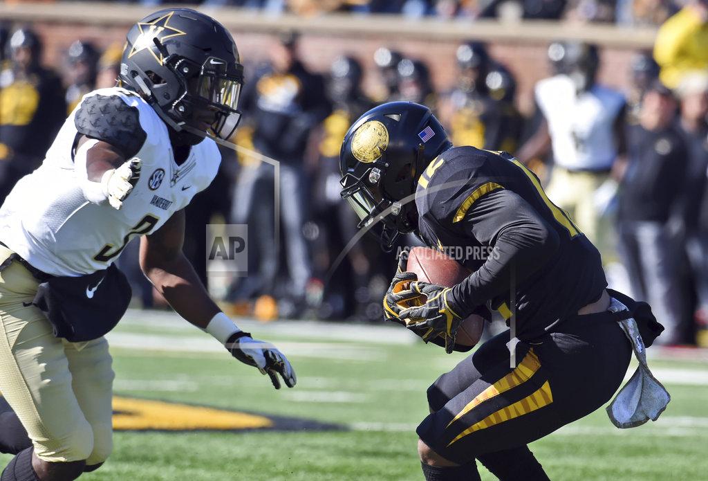 L.g. Patterson Missouri wide receiver Johnathon Johnson, right, catches a pass as Vanderbilt defensive back Tae Daley closes in during the first half of an NCAA college football game Saturday, Nov. 10, 2018, in Columbia, Mo. (AP Photo/L.G. Patterson)