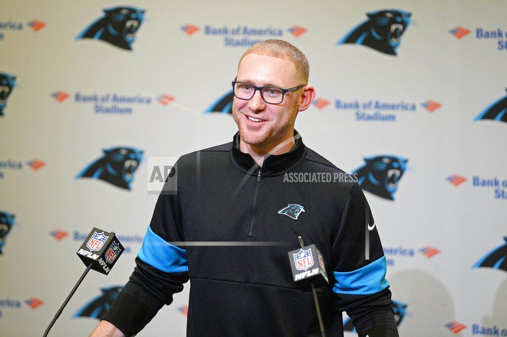 David T. Foster Iii Carolina Panthers NFL football team's new offensive coordinator Joe Brady listens to a question from the media during his introductory press conference at Bank of America Stadium in Charlotte, N.C., Friday, Jan. 17, 2020. (David T. Foster III/The Charlotte Observer via AP)