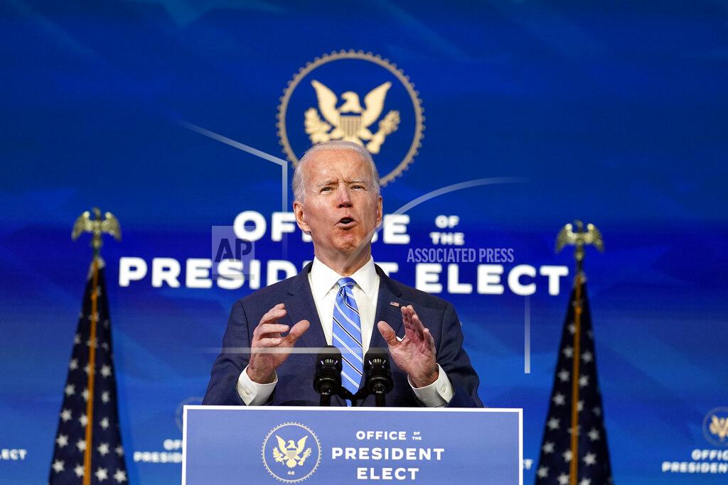 Matt Slocum President-elect Joe Biden speaks about the COVID-19 pandemic during an event at The Queen theater, Thursday, Jan. 14, 2021, in Wilmington, Del. (AP Photo/Matt Slocum)