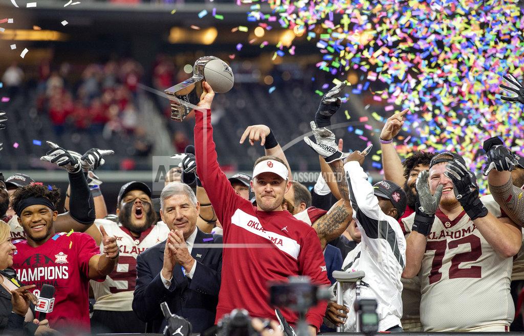 Jeffrey Mcwhorter FILE - In this Dec. 1, 2018, file photo, Oklahoma head coach Lincoln Riley hoists the Big 12 Conference championship trophy after beating Texas 39-27 in the Big 12 Conference championship NCAA college football game, in Arlington, Texas. Riley was selected coach of the year when the AP All-Big 12 team was announced Friday, Dec. 7, 2018.
(AP Photo/Jeffrey McWhorter, File)