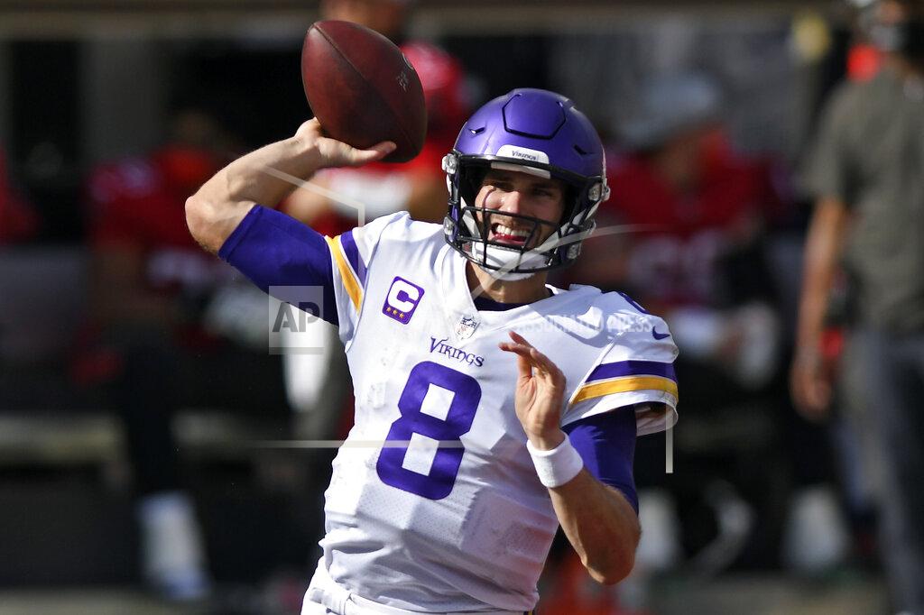 Jason Behnken Minnesota Vikings quarterback Kirk Cousins (8) throws a pass against the Tampa Bay Buccaneers during the first half of an NFL football game Sunday, Dec. 13, 2020, in Tampa, Fla. (AP Photo/Jason Behnken)