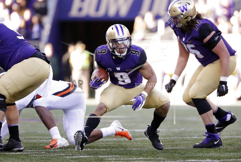 Elaine Thompson Washington's Myles Gaskin (9) rushes against Oregon State in the first half of an NCAA college football game Saturday, Nov. 17, 2018, in Seattle. (AP Photo/Elaine Thompson)