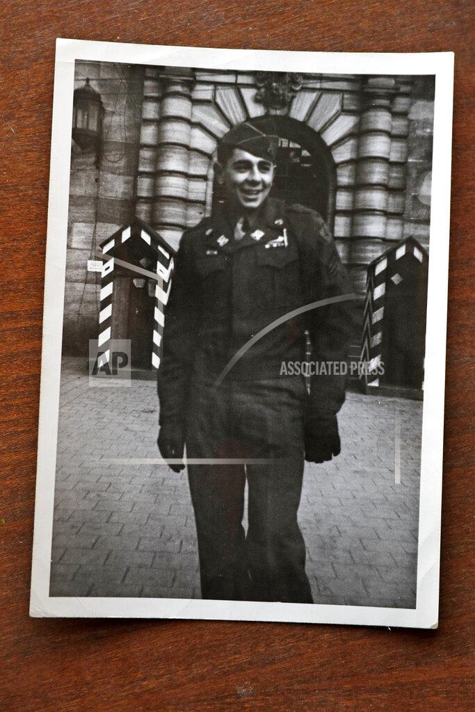 Uncredited In this 1945 or 1946 photograph provided by Emily DiPalma Aho, Emily DiPalma Aho's father, Emilio DiPalma, stands outside the Palace of Justice in Nuremberg, Germany. Emilio died last month at the age of 93 after contracting the coronavirus at Holyoke Soldiers' Home in Massachusetts. (Courtesy of Emily DiPalma Aho via AP)