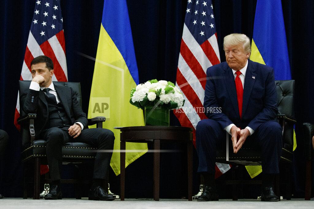 Evan Vucci FILE - In this Sept. 25, 2019 file photo President Donald Trump meets with Ukrainian President Volodymyr Zelenskiy at the InterContinental Barclay New York hotel during the United Nations General Assembly in New York. Ukraine — which has played an unwitting backstage role in American political battles of late — is walking a thin line: trying to avoid being drawn into U.S. election drama, while also not being forgotten by the powers in Washington. (AP Photo/Evan Vucci, File)