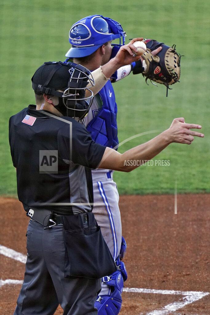 Chris O'meara Home plate umpire Kaleb Devier calls a strike during a Low A Southeast League baseball game between the Dunedin Blue Jays and the Tampa Tarpons at George M. Steinbrenner Field Tuesday, May 4, 2021, in Tampa, Fla. The game is one of the first in the league to use automatic balls and strike calls. (AP Photo/Chris O'Meara)