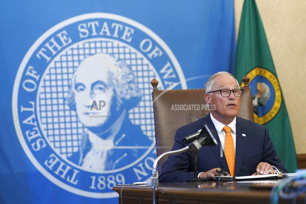Ted S. Warren Washington Gov. Jay Inslee speaks Thursday, June 3, 2021, during a news conference in Olympia, Wash. Inslee announced that Washington will be the latest state to offer prizes to encourage people to get vaccinated against COVID-19. Incentives will include a series of giveaways during the month of June including lottery prizes totaling $2 million, college tuition assistance, airline tickets, and game systems. (AP Photo/Ted S. Warren)