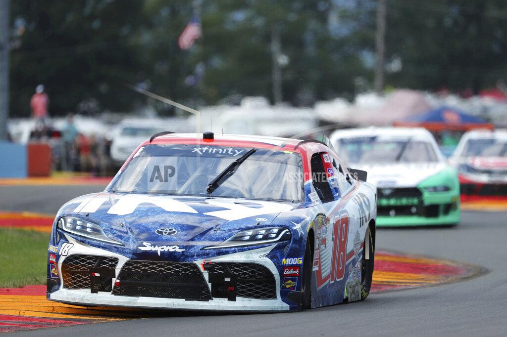 John Munson Kyle Busch (18) leads eventual winner Austin Cindric early in the NASCAR Xfinity Series auto race at Watkins Glen International, Saturday, Aug. 3, 2019, in Watkins Glen, N.Y (AP Photo/John Munson)