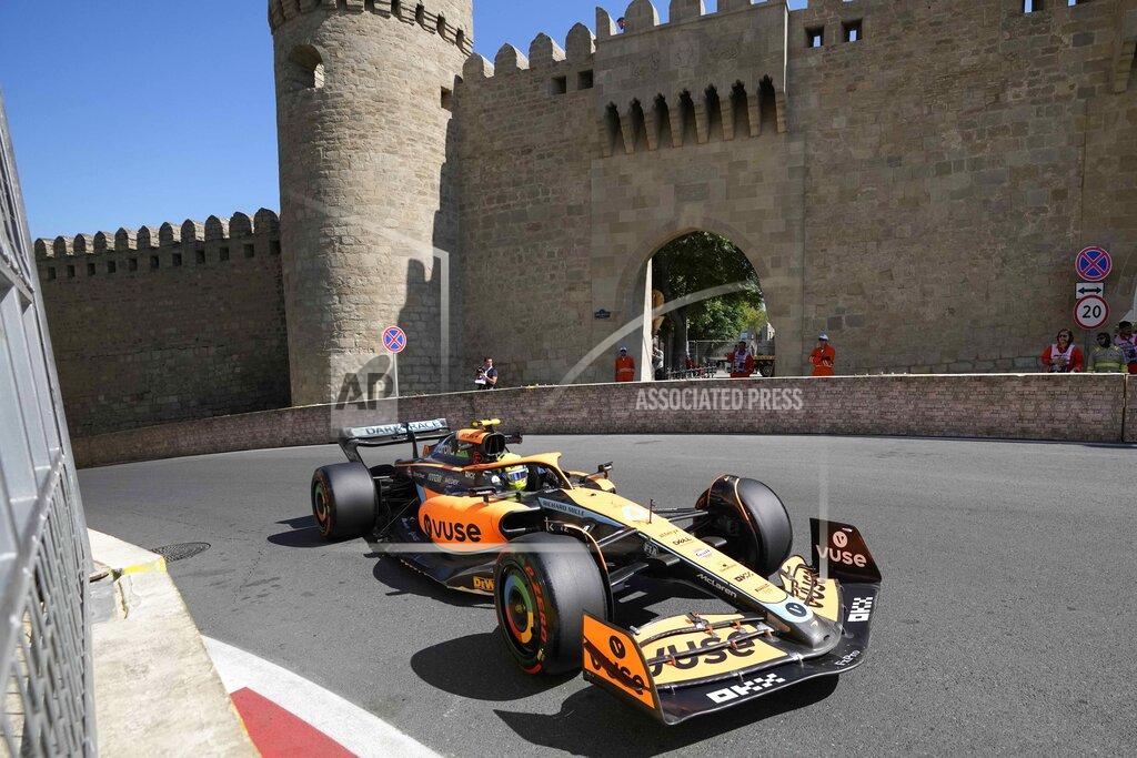 Sergei Grits Mclaren driver Lando Norris of Britain steers his car during the first free practice at the Baku circuit, in Baku, Azerbaijan, Friday, June 10, 2022. The Formula One Grand Prix will be held on Sunday. (AP Photo/Sergei Grits)