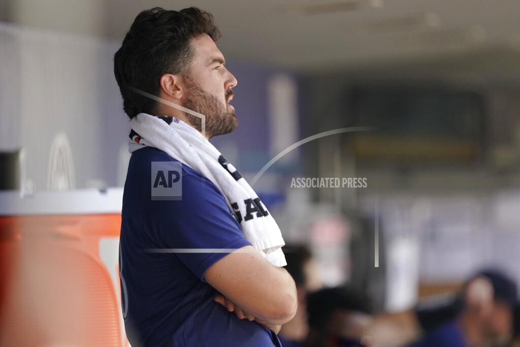 Ted S. Warren Seattle Mariners starting pitcher Robbie Ray stands in the dugout after pitching the sixth inning of the team's baseball game against the Oakland Athletics, Wednesday, May 25, 2022, in Seattle. (AP Photo/Ted S. Warren)
