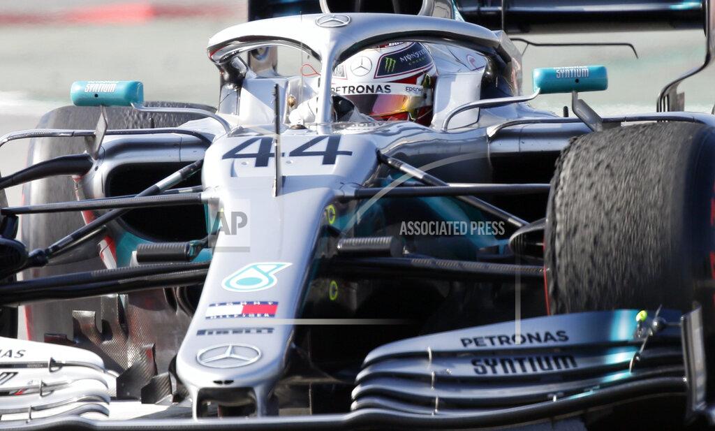 Mercedes driver Lewis Hamilton of Britain steers his car during a Formula One pre-season testing session at the Barcelona Catalunya racetrack in Montmelo, outside Barcelona, Spain, Thursday, Feb.21, 2019. (AP Photo/Joan Monfort)