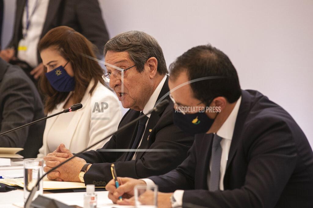 Yorgos Karahalis Cyprus' President Nikos Anastasiades, center, speaks during a meeting in Athens, on Wednesday, July 28, 2021. Greece is hosting a one-day trilateral meeting of the three leaders. (AP Photo/Yorgos Karahalis)